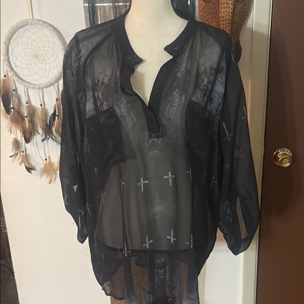 Chic Black Blouse with Sheer Sleeves and Elegant Design